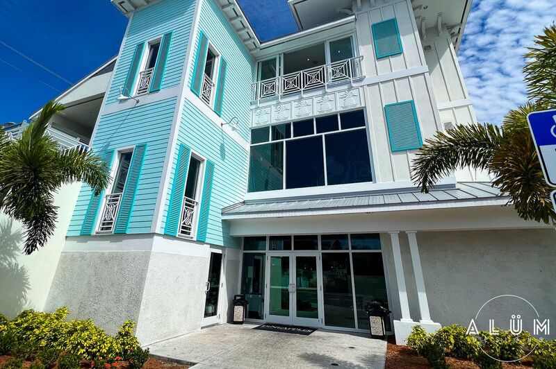 Pineapples EGAD White Aluminum Pineapple Detail Railings and Bahama Shutters