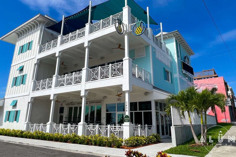 Pineapples EGAD White Aluminum Pineapple Detail Railings and Bahama Shutters